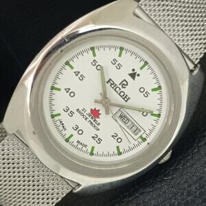 Vintage 1970 Ricoh Automatic Mens Silver Watch W/daydate & Green accents